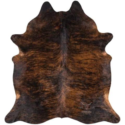 Tom Tom Cowhides thumbnail